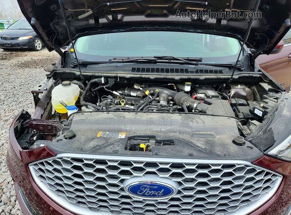 2FMPK4J96RBB22432 2024 FORD EDGE Maroon Widok wnętrza z tyłu