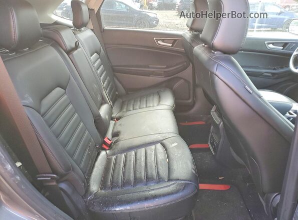 2FMPK4J97NBA17103 2022 FORD EDGE Gray Vista interior trasera