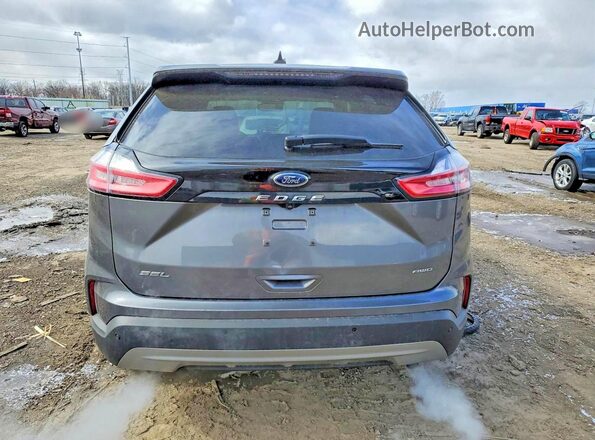 2FMPK4J97NBA17103 2022 FORD EDGE Gray Vista trasera