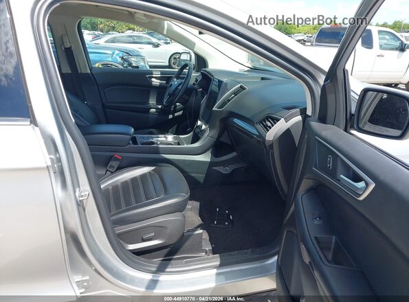 2FMPK4J98PBA21048 2023 FORD EDGE Серебряный Вид салона спереди