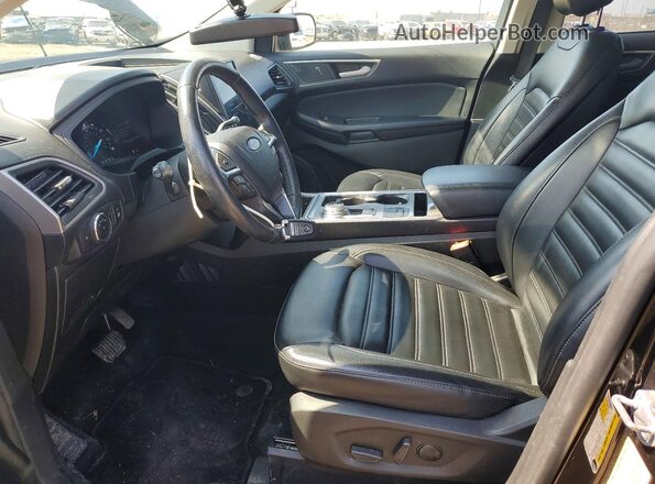 2FMPK4J99PBA06722 2023 FORD EDGE Черный Вид салона спереди