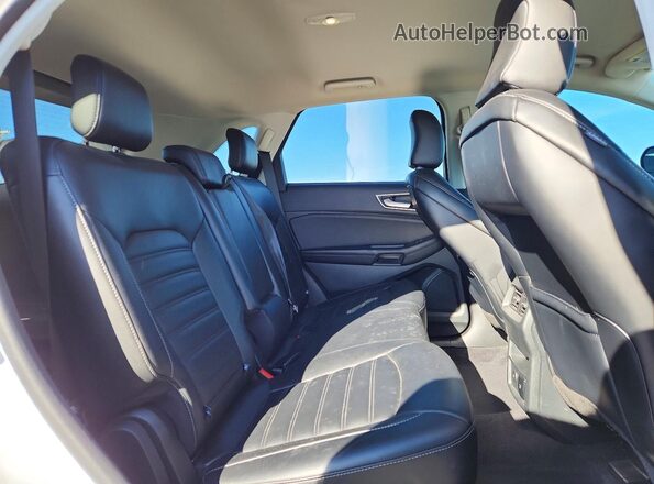 2FMPK4J9XRBA16212 2024 FORD EDGE White Widok wnętrza z tyłu