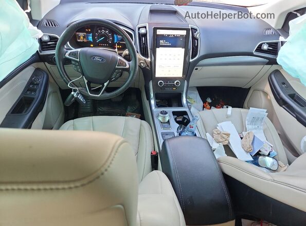 2FMPK4K97MBA27160 2021 FORD EDGE Белый Вид панели приборов