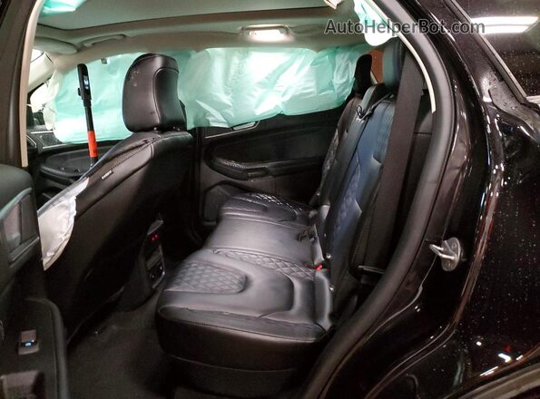 2FMPK4K97RBA83770 2024 FORD EDGE Black Vista interior trasera