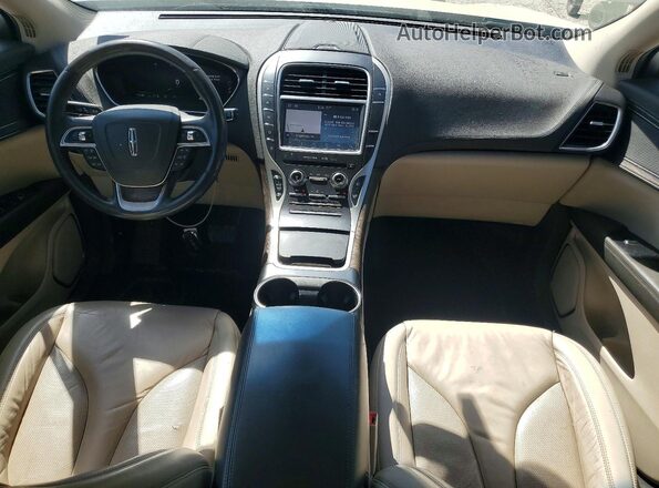 2LMPJ6K90KBL66682 2019 LINCOLN NAUTILUS Белый Вид панели приборов