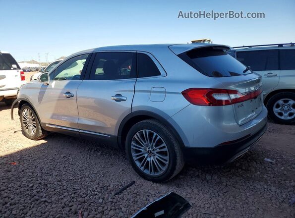 2LMPJ6LR8HBL29077 2017 LINCOLN MKX Серебряный Задняя левая четверть