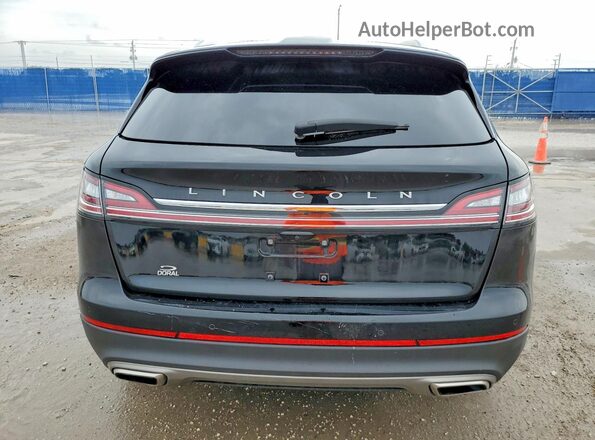 2LMPJ8J9XPBL21589 2023 LINCOLN NAUTILUS Черный Вид сзади