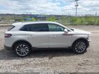 2022 Lincoln Nautilus Reserve Beige vin: 2LMPJ8K90NBL01931