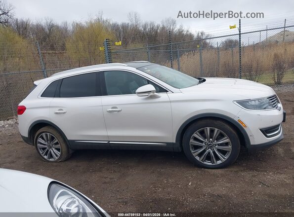 2LMPJ8LP5HBL38099 2017 LINCOLN MKX White Widok wnętrza z tyłu
