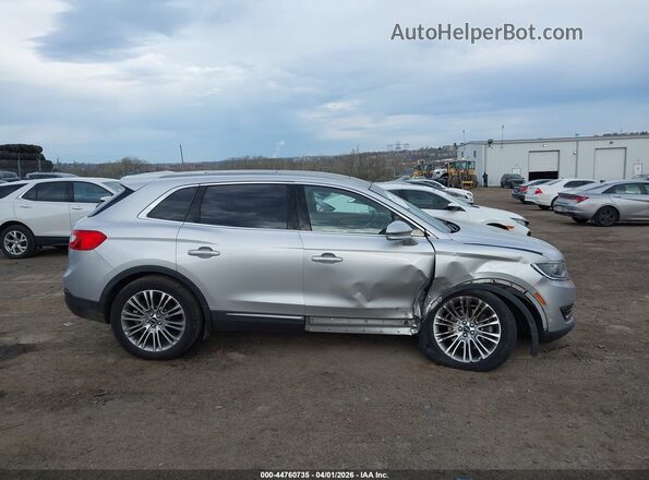 2LMPJ8LR1HBL33810 2017 LINCOLN MKX Silver Widok wnętrza z tyłu