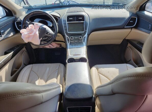 2LMPJ8LR7HBL24206 2017 LINCOLN MKX Beige Вид панелі приладів