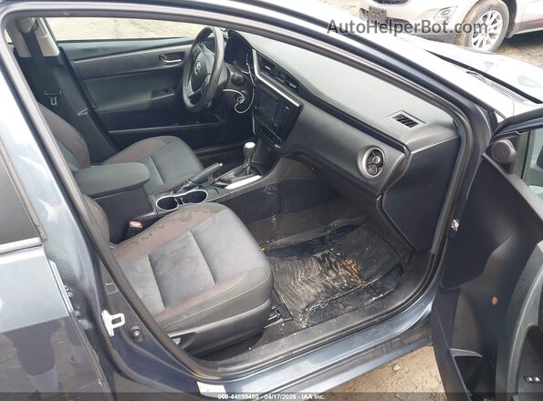 2T1BURHE2HC859478 2017 TOYOTA LL Серый Вид салона спереди