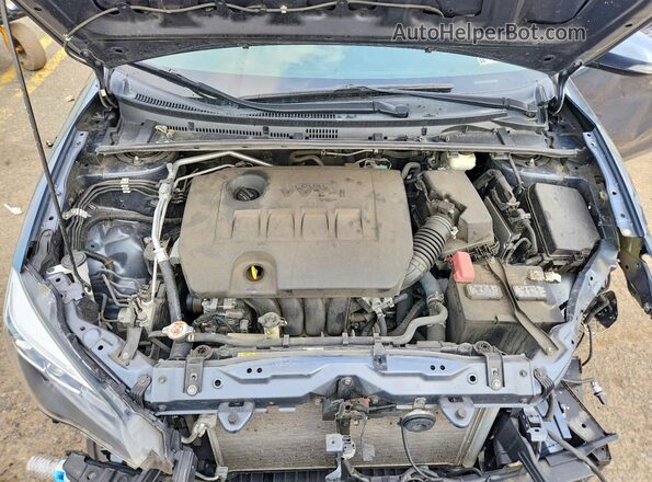 2T1BURHE3JC089779 2018 TOYOTA LL Gray Widok wnętrza z tyłu