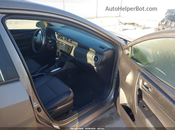 2T1BURHE4JC071811 2018 TOYOTA LL Gray Front interior view