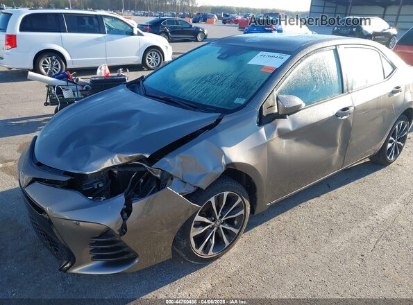 2T1BURHE4JC071811 2018 TOYOTA LL Gray Front view