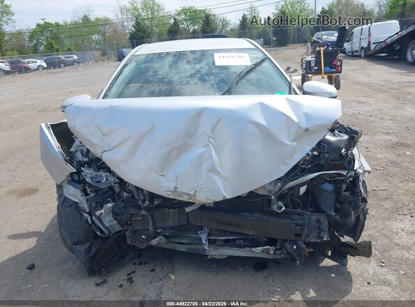 2T1BURHEXJC062885 2018 TOYOTA LL Серебряный Вид задней части салона