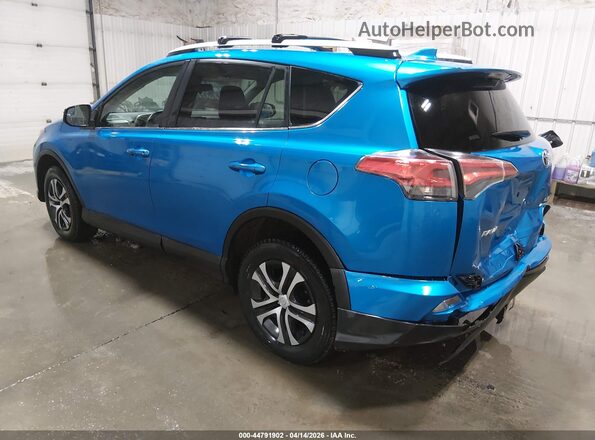 2T3BFREV7GW531525 2016 TOYOTA LE Blue Rear left
