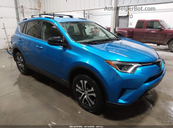 2T3BFREV7GW531525 2016 TOYOTA LE Blue Front right