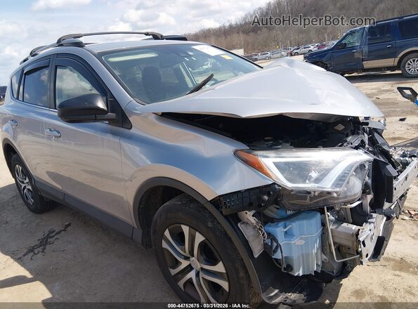 2T3BFREV8HW587863 2017 TOYOTA LE Silver Przód prawy