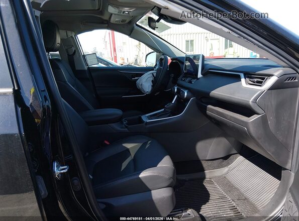2T3C1RFV4RW301011 2024 TOYOTA LE Black Widok wnętrza z przodu
