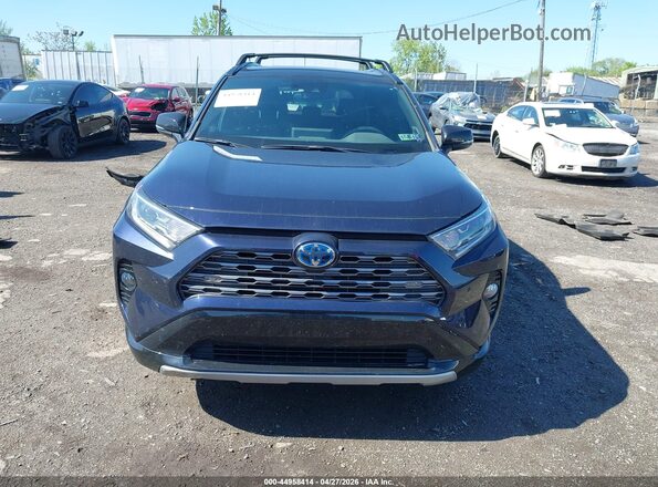 2T3EWRFV9LW072875 2020 TOYOTA RAV4 HYBRID Dark Blue Widok wnętrza z tyłu