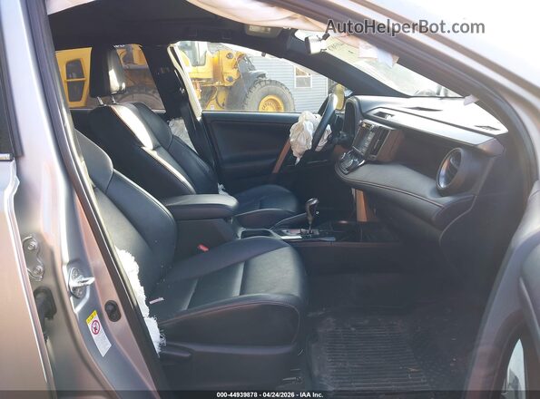 2T3JFREV3GW430543 2016 TOYOTA RAV4 Silver Widok wnętrza z przodu