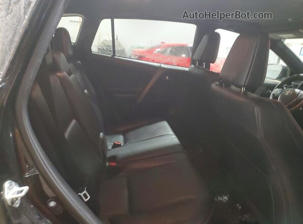 2T3JFREVXJW780503 2018 TOYOTA RAV4 Black Vista interior trasera