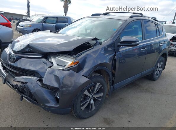 2T3RFREV1JW844561 2018 TOYOTA LE Gray Przód lewy
