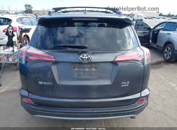 2T3RFREV1JW844561 2018 TOYOTA LE Gray 