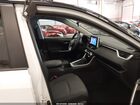 2025 Toyota Rav4 Hybrid Woodland Edition White vin: 2T3UWRFV1SW282669