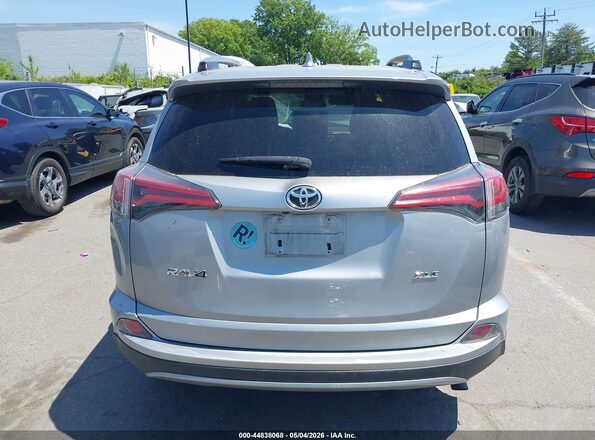 2T3WFREV1JW501154 2018 TOYOTA LE Silver 