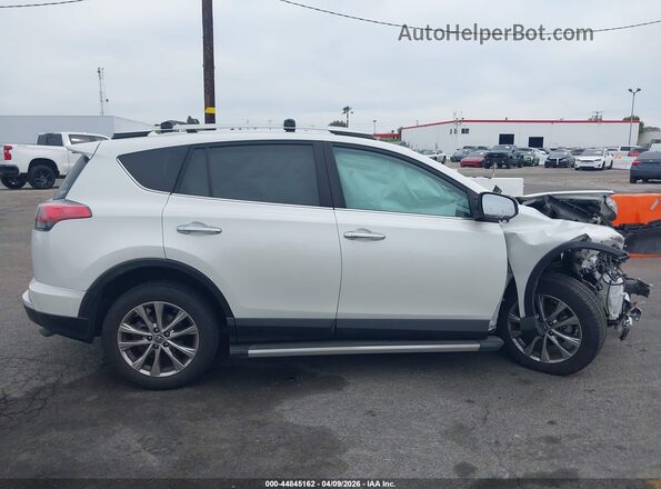 2T3YFREV9GW293395 2016 TOYOTA LIMITED Белый Вид задней части салона