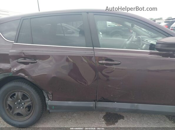 2T3ZFREV0JW508285 2018 TOYOTA LE Maroon Vista interior trasera