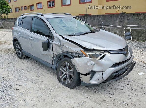 2T3ZFREV9HW334713 2017 TOYOTA LE Silver Передня права чверть