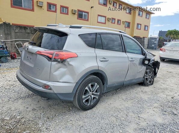 2T3ZFREV9HW334713 2017 TOYOTA LE Silver Задня права чверть