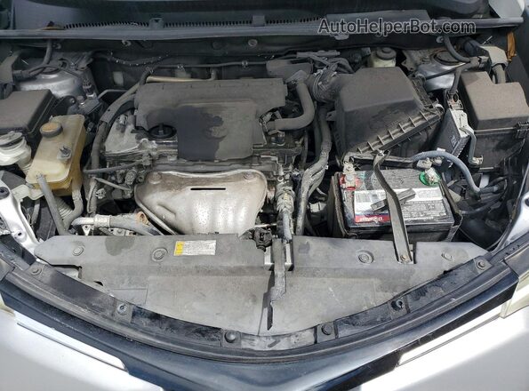 2T3ZFREV9HW334713 2017 TOYOTA LE Silver Вид задньої частини салону
