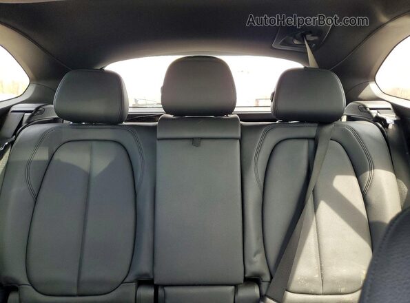 WBXHT3C36G5F63784 2016 BMW X1 Синий Вид задней части салона