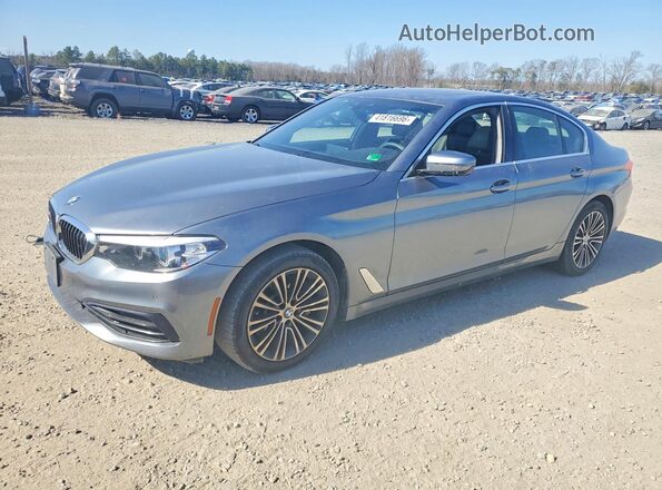 WBAJA7C56KWW06725 2019 BMW OTHER Серый Передняя левая четверть