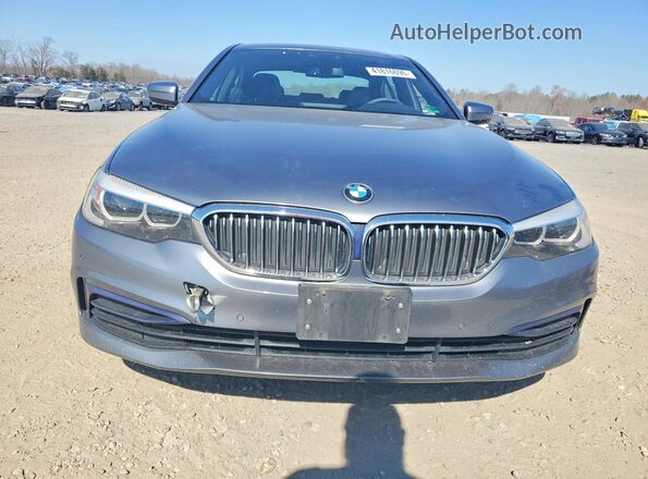 WBAJA7C56KWW06725 2019 BMW OTHER Серый Вид сзади
