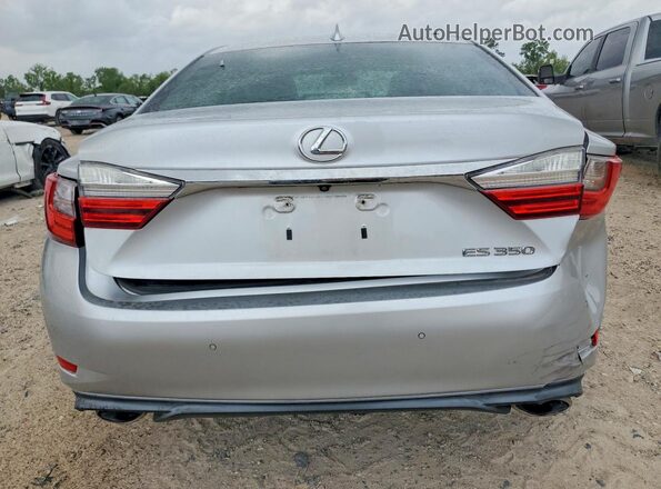 58ABK1GG9GU002848 2016 LEXUS ES Серебряный Вид салона спереди