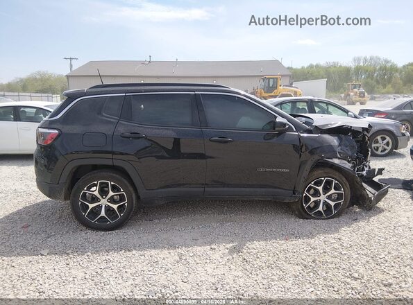 3C4NJDCN7RT102221 2024 JEEP COMPASS Черный Вид задней части салона