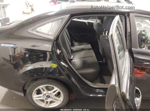 3FADP4BJ8JM128047 2018 FORD FIESTA Black Vista de la etiqueta del VIN
