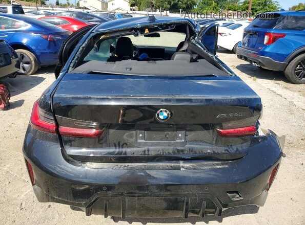 3MW49FS02P8C96384 2023 BMW M3 Black Vista trasera