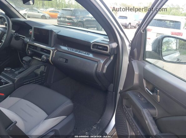 3TMLB5JN4TM223433 2026 TOYOTA TACOMA Серый Вид салона спереди