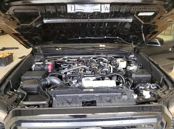 3TMLB5JN8TM243376 2026 TOYOTA TACOMA Черный Вид задней части салона