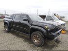 2025 Toyota Tacoma Hybrid Trailhunter Черный vin: 3TYLC5LN9ST038601