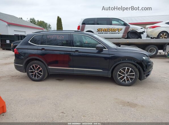 3VV3B7AX5MM128184 2021 VOLKSWAGEN TIGUAN Черный Вид задней части салона