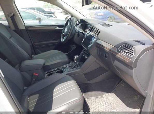 3VVAB7AX0RM235058 2024 VOLKSWAGEN TIGUAN White Vista interior delantera