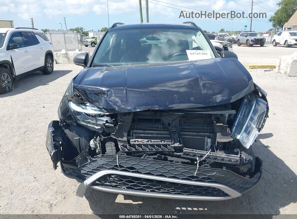 3VVCX7B28PM375692 2023 VOLKSWAGEN TAOS Черный Вид задней части салона