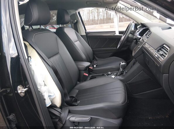 3VVMB7AX7PM124341 2023 VOLKSWAGEN TIGUAN Black Front interior view
